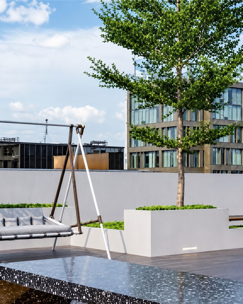 Rooftop swing with skyline views